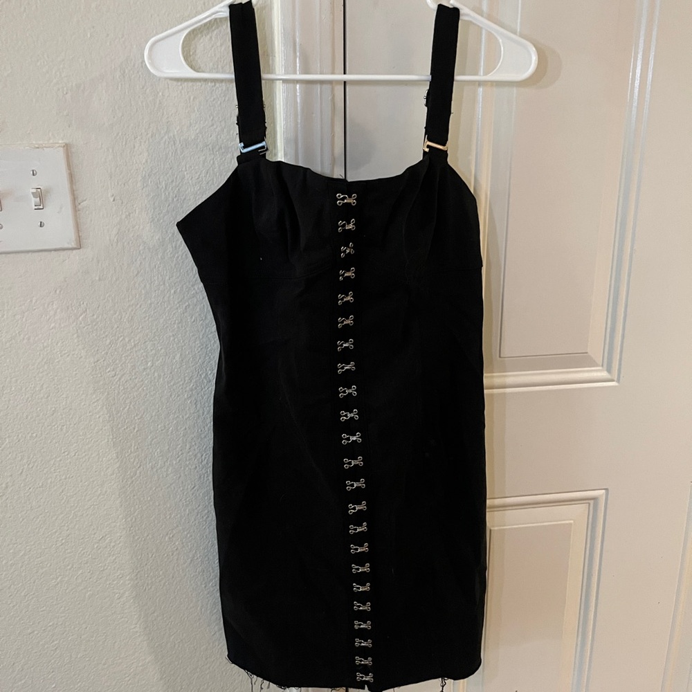 Elegant Black Dress with Hook Detailing